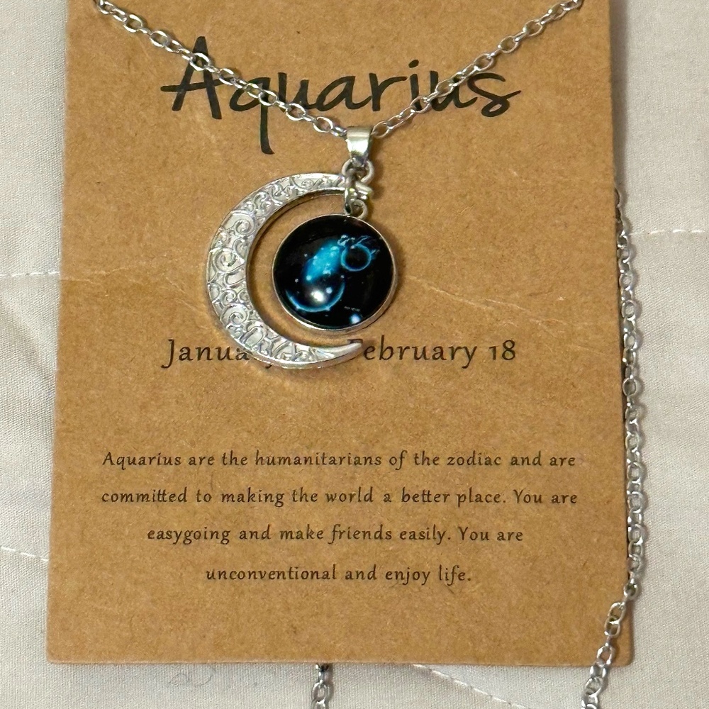 Luminous, Aquarius zodiac pendant, turquoise w/silver tone crescent moon.